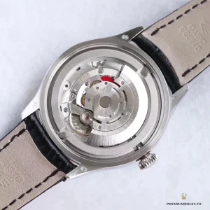 Display caseback of a Cellini 50509 showing the automatic movement, black leather strap