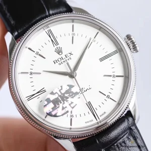 Close-up of white dial with Roman numerals and baton hour markers