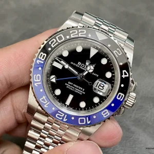 Black dial with Chromalight indices and green GMT triangle hand