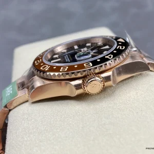 Black dial detail with rose gold applied indices and Mercedes hands