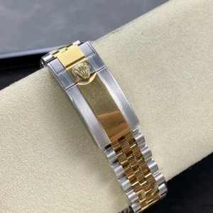 Black dial detail showing Chromalight indices and GMT triangle hand