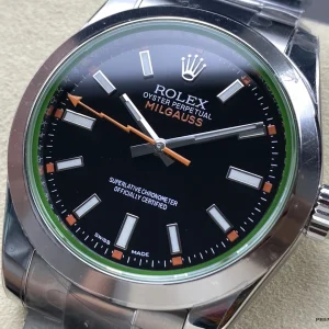 Milgauss 116400GV lume shot showing green luminous markers