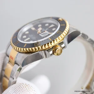 Wrist shot of the 126603 Rolesor Sea-Dweller in warm lighting