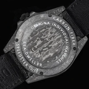 Carbon Sea-Dweller lume shot with bright luminous indices glowing