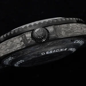 Matte black dial detail with luminous hour markers and date window