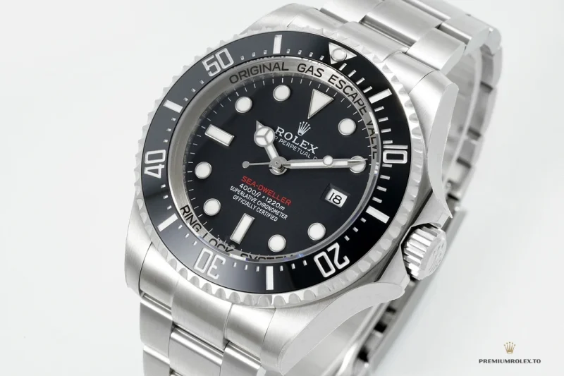 Sea-Dweller 126600 with black dial, red model name and black bezel, three-quarter studio view