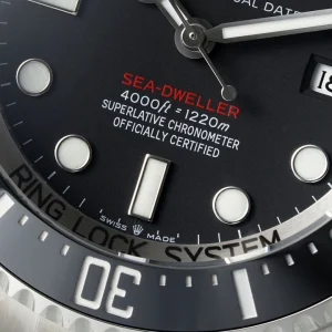 Wrist shot of Sea-Dweller 126600 on Oyster bracelet in natural light