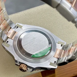 Replica GMT-Master II Root Beer bracelet close-up showing two-tone Oyster links