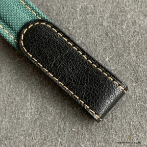 GMT-Master II forged carbon case close-up showing unique fiber grain pattern