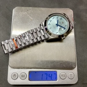 Close-up of domed bezel and sapphire crystal on the Day-Date