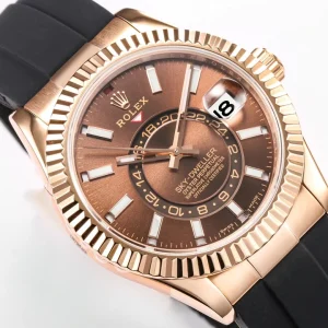Sky-Dweller with chocolate dial, rose gold-plated case and black rubber strap, studio three-quarter view