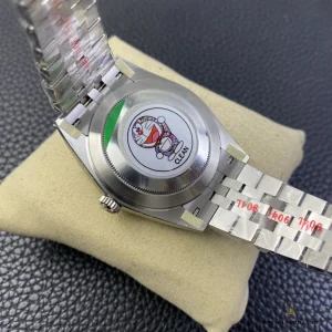 Crown side view with fluted bezel catching overhead light