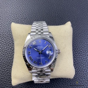 Dial close-up of blue sunburst finish with white Roman numerals