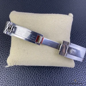 Datejust 126334 at angle showing diamond markers against black dial