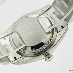 Day-Date 228236 crown side showing screw-down winding crown