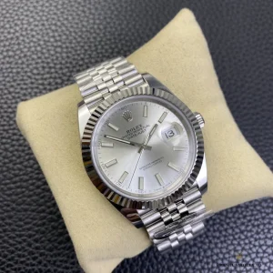 Datejust 41 126334 with silver dial, fluted bezel and Jubilee bracelet on a watch cushion