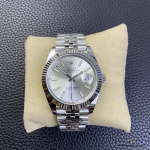 Datejust 41 126334 silver dial on Jubilee bracelet, front view on a watch cushion