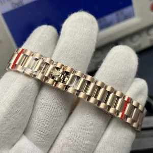 Lady-Datejust 279135RBR dial close-up with applied Everose gold hour markers and date window