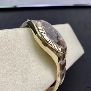 Wrist shot of Sky-Dweller 326935 chocolate brown on rose gold-plated bracelet