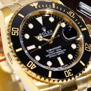 Three-quarter angle of gold Submariner 116618LN highlighting case geometry