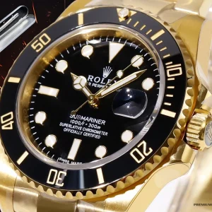 Black Cerachrom bezel close-up with gold-filled numerals on 116618LN