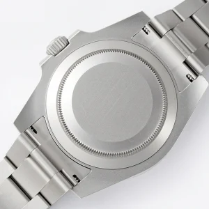 Three-quarter angle of Submariner 116610AR highlighting carbon weave on dial
