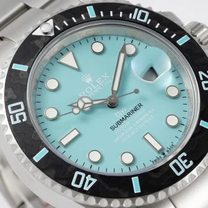 Three-quarter angle of Submariner Tiffany highlighting aqua dial under studio light