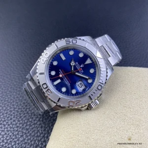 Yacht-Master 126622 with blue dial, raised-number bezel and Oyster bracelet on a watch cushion