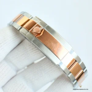 Chocolate-brown Cerachrom bezel close-up with raised numerals