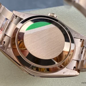 Caseback of Sky-Dweller 326935 with polished rose gold-plated finish and markings