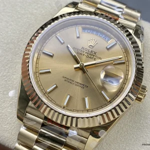 Day-Date 228238 with champagne dial, TUESDAY day window and gold-plated President bracelet