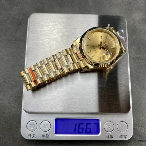 Rolex 228238 overhead angle highlighting fluted bezel symmetry