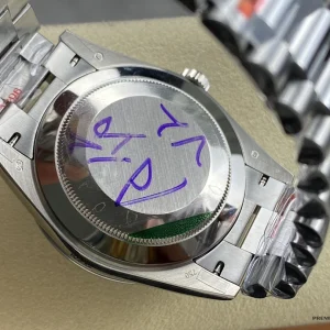 Rolex Day-Date 228239 crown side with screw-down crown visible