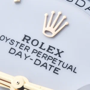 Day-Date M228238 crown close-up with Twinlock screw-down and Rolex logo