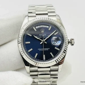 Rolex Day-Date 228239AF dial close-up with applied platinum-tone hour markers and hands