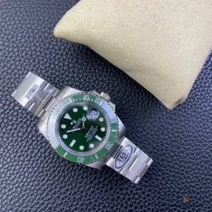Submariner 116610LV dial close-up with Chromalight markers and date at 3