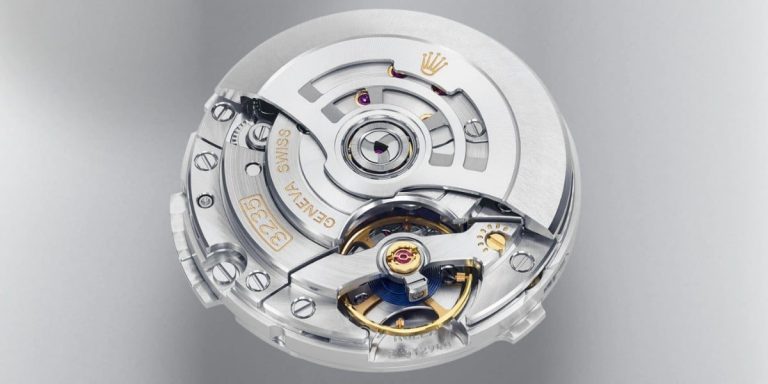 Rolex Caliber 3235 movement showing decorated rotor blue Parachrom hairspring and balance wheel