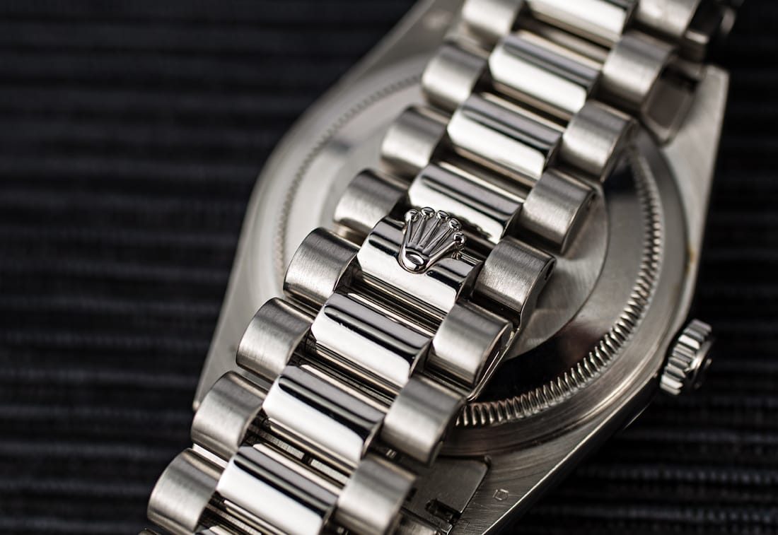 Rolex President bracelet clasp with Rolex crown logo on platinum Day-Date