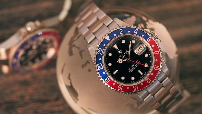 Rolex GMT-Master II Pepsi bezel showing red and blue ceramic