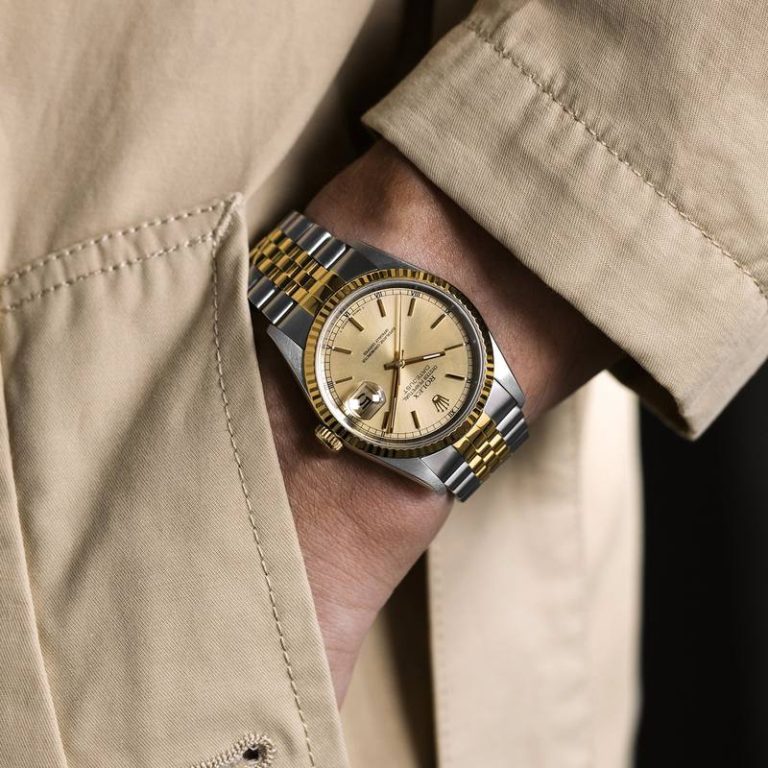 Rolex Datejust two-tone yellow gold and steel on wrist with champagne dial