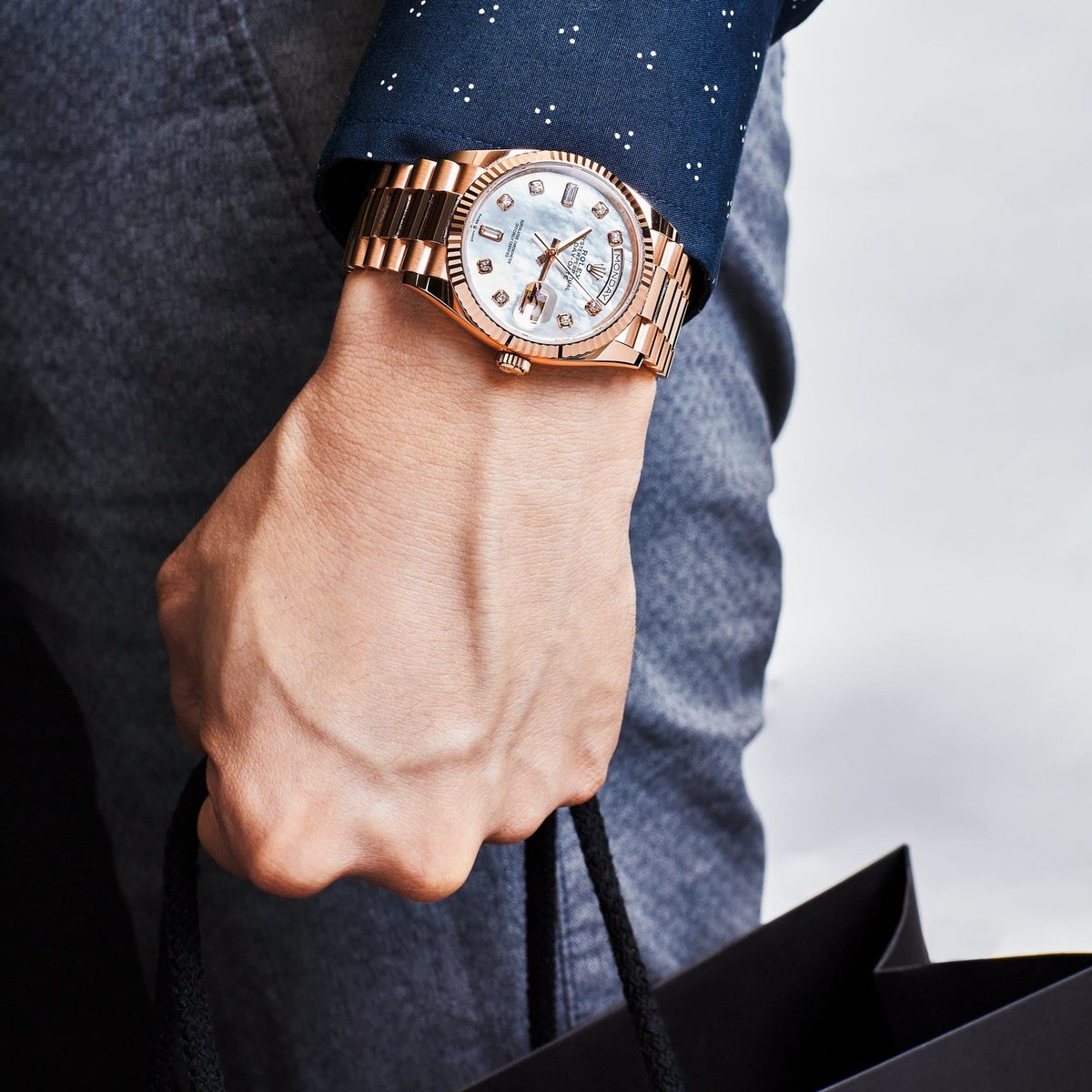 Rolex Day-Date rose gold Everose on wrist with mother of pearl dial