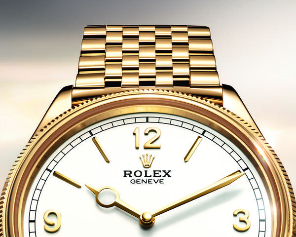Gold Rolex watch showing bracelet and case finishing details