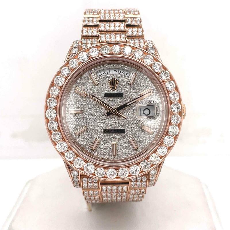 Bust down Rolex Day-Date in rose gold with large diamond bezel and pave dial