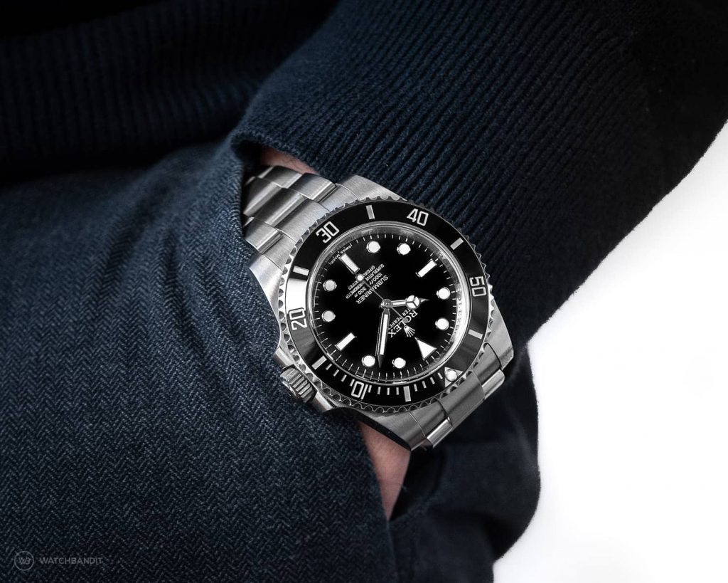Rolex Submariner on wrist showing the current proven model available now