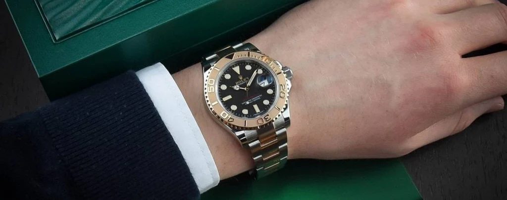 Rolex replica watch on wrist representing personal use ownership