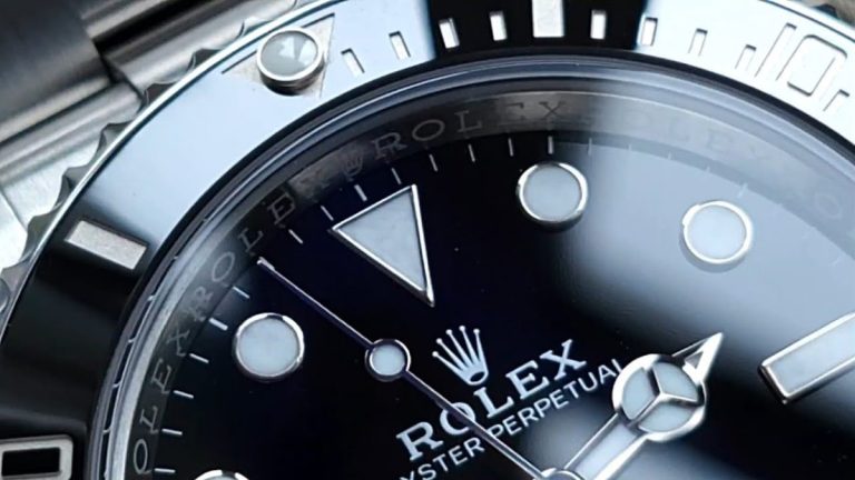 Rolex replica mistakes - close-up Submariner dial showing QC inspection details
