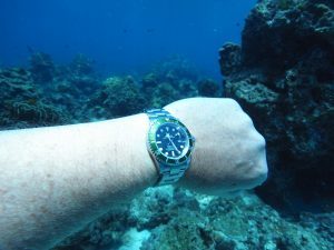 Watch submerged in water showing water resistance